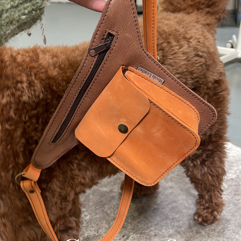 
                      
                        doggybag-uitlaattas-hond-crossbody-snacktas-cognac oranje
                      
                    